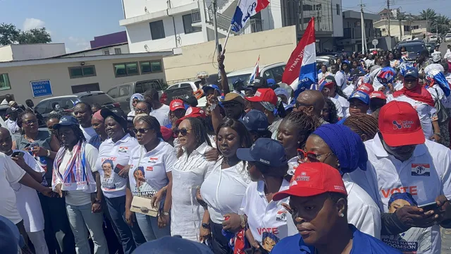 Attendees gathered along the street